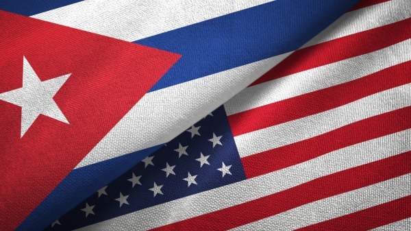 Cuba and United States flags together textile cloth, fabric texture