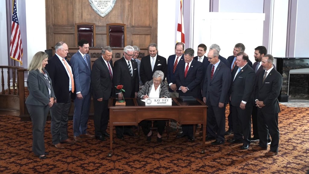 Alabama Gov. Kay Ivey signs bills approving prison construction into law