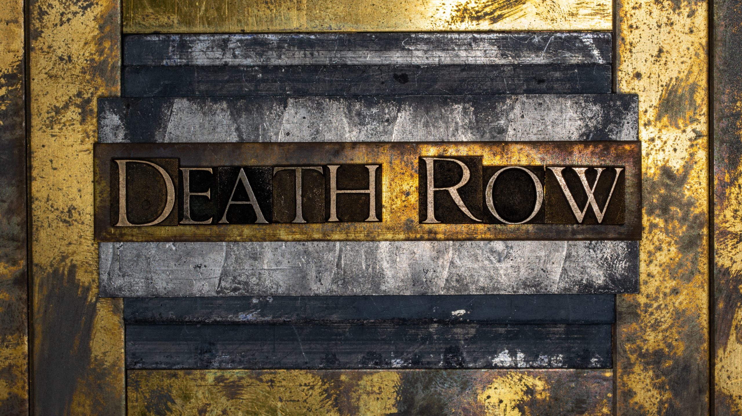Death Row text on grunge lead with textured copper and gold background