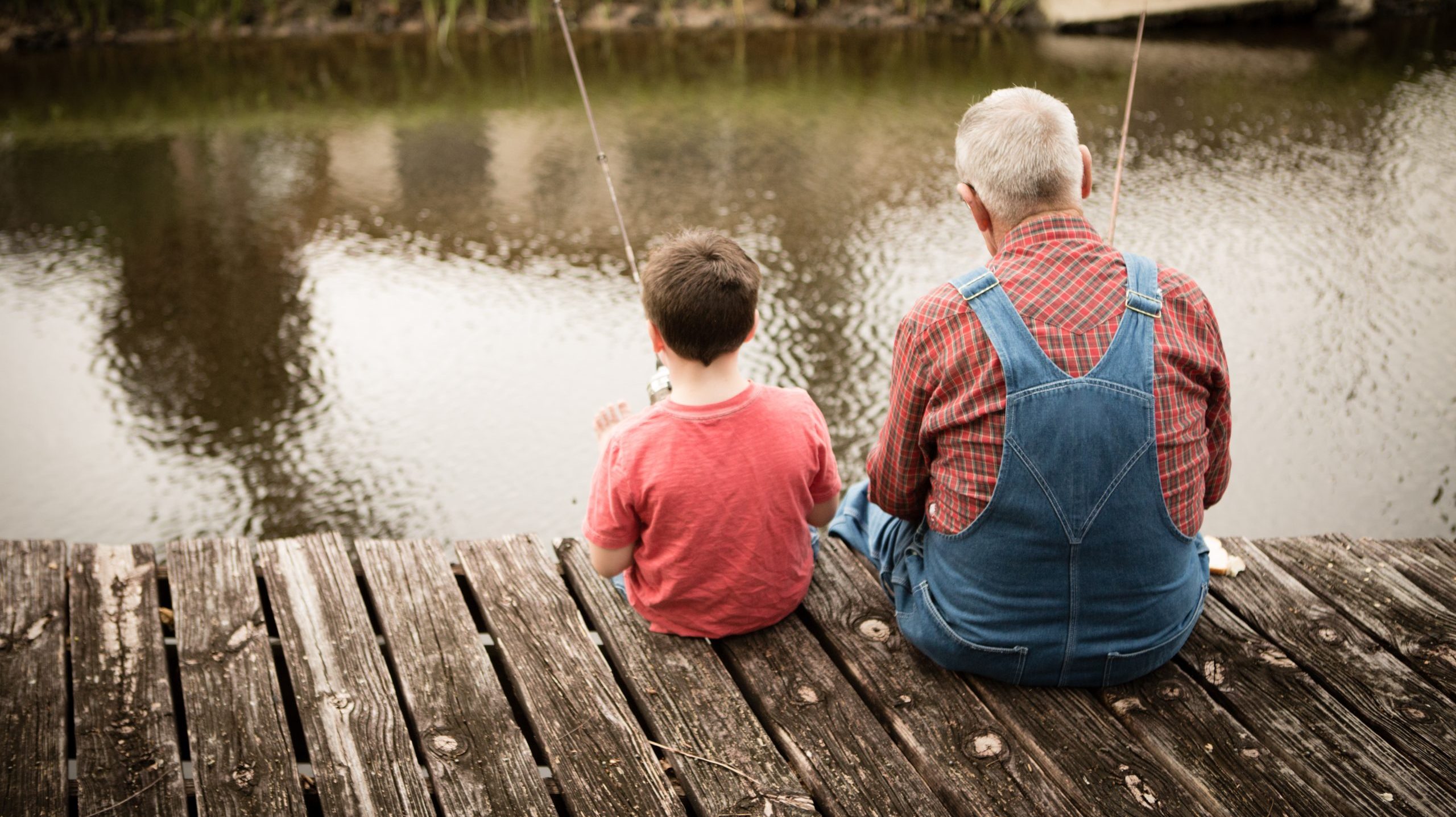 Grandfather and Grandson Fishing Together