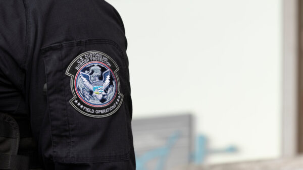 Los Angeles, California, USA - June 10, 2025: U.S. Customs and Border Protection (CBP) field officers guard a federal building during ICE deportation protests in Downtown LA.