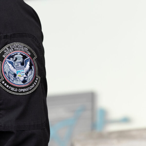 Los Angeles, California, USA - June 10, 2025: U.S. Customs and Border Protection (CBP) field officers guard a federal building during ICE deportation protests in Downtown LA.