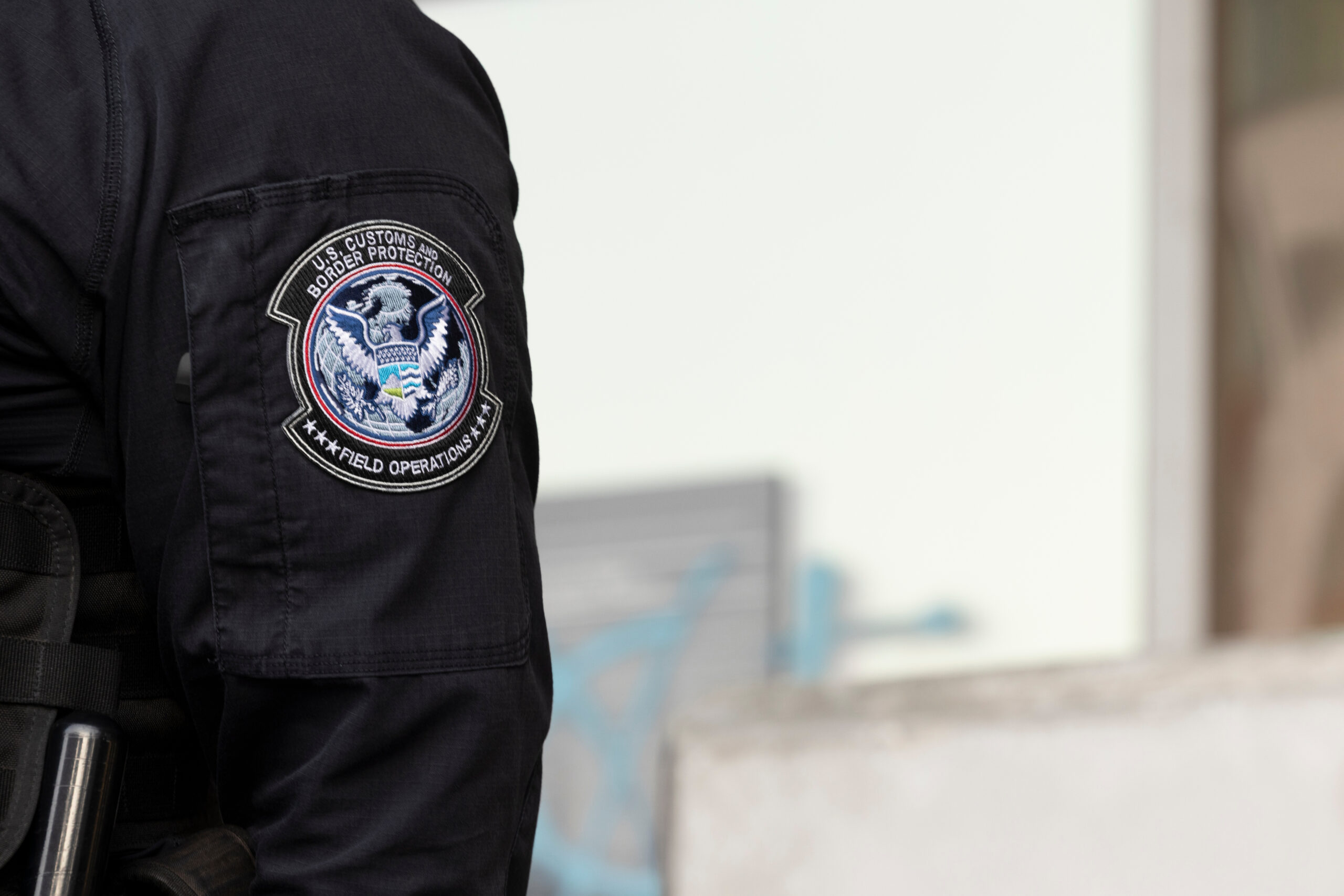 Los Angeles, California, USA - June 10, 2025: U.S. Customs and Border Protection (CBP) field officers guard a federal building during ICE deportation protests in Downtown LA.