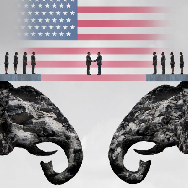 American conservative agreement and Republican reconciliation concept as two mountain cliffs shaped as an elephant symbol coming together as an American political accoprd symbol as a 3D illustration.